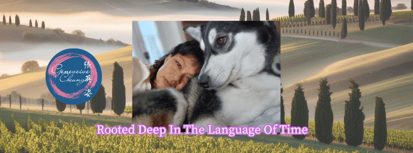 Genevieve Cheung resting beside her husky in the Tuscan countryside, expressing rooted presence, companionship, and lived time